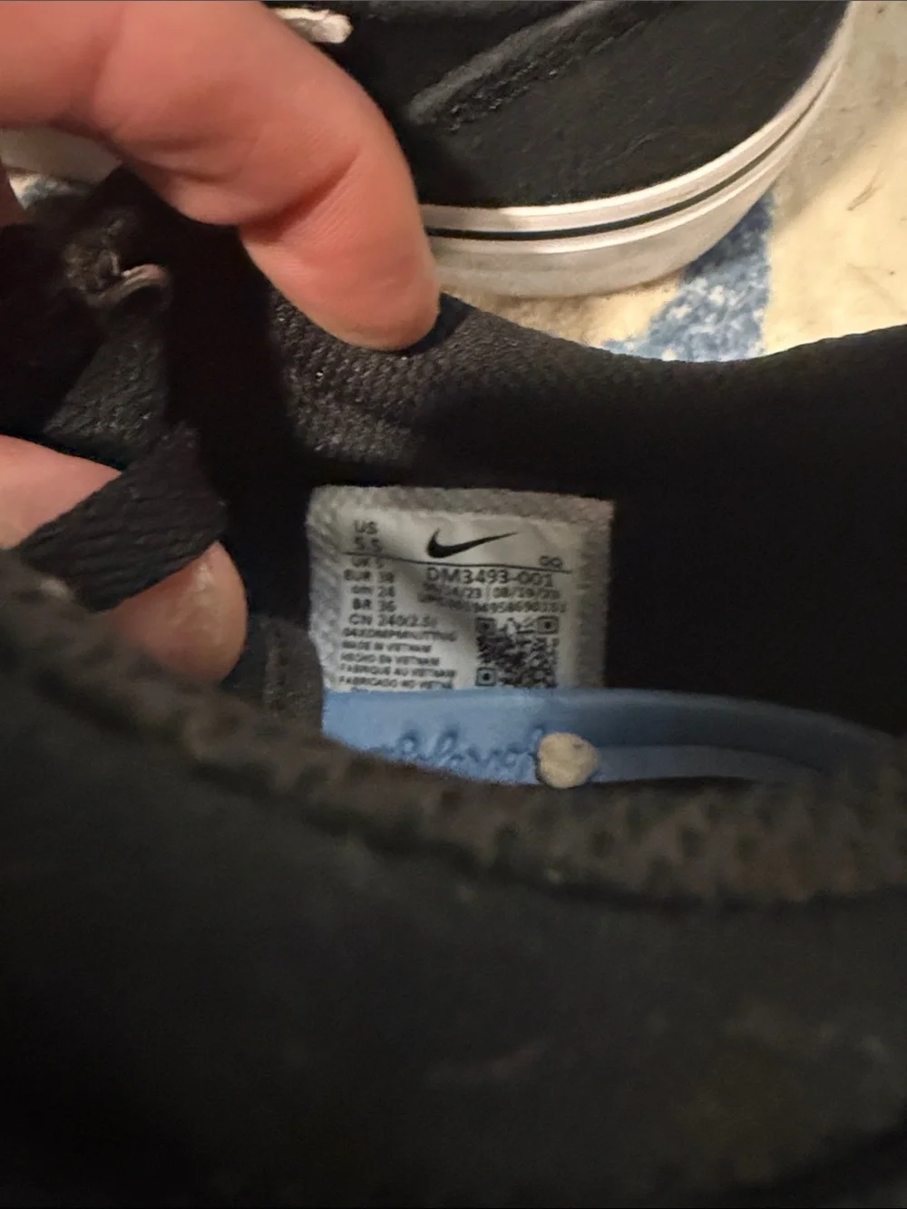Nike Black and White Low-Top Canvas Sneakers